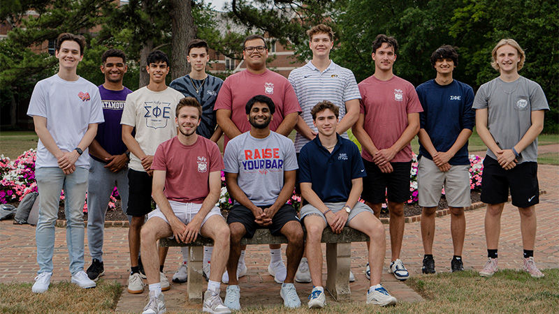 Outdoor group photo of fraternity members